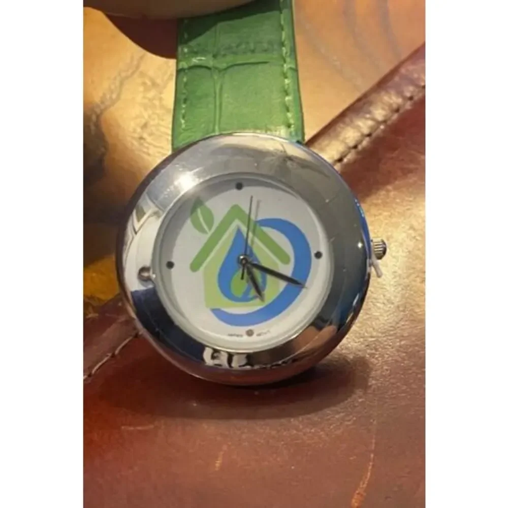 Women's 40mm Silver Tone Norwex Watch, Green Band with Company Logo Face